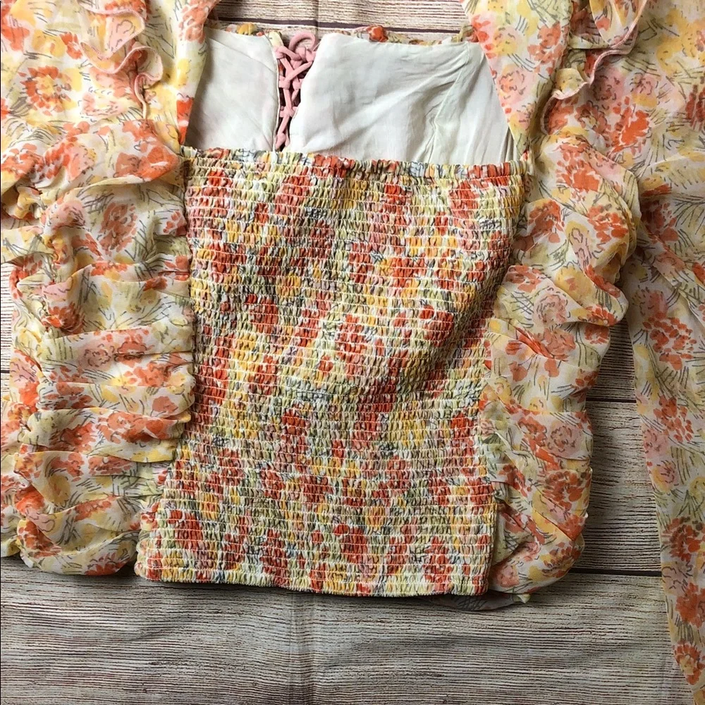 Free People Mabel Fairy Sheet printed ruched‎ blouse with a floral pattern